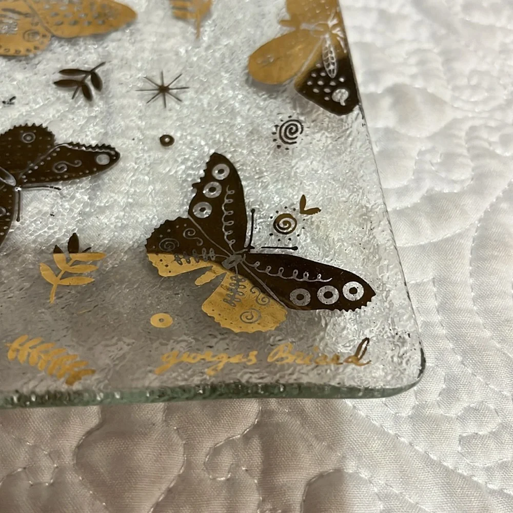 Set of four Georges‎ Briard square plates